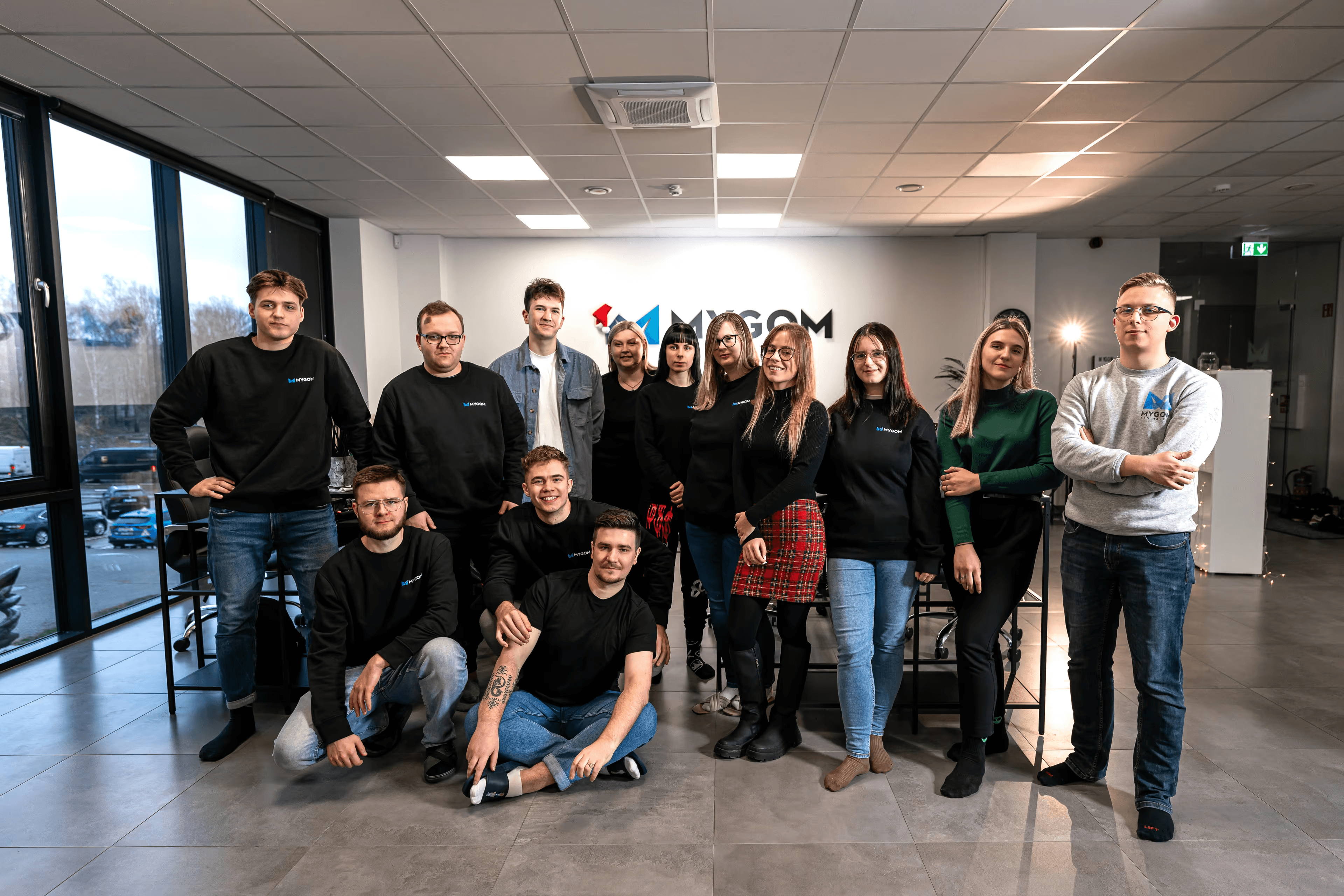 Mygom.tech engineering team working on AI-powered products